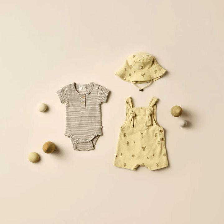 Flatlay-of-Outfit-with-Wilson-and-Frenchy-Organic-Rib-Stripe-Henely-Onesie-Leaf-Stripe-Naked-Baby-Eco-Boutique
