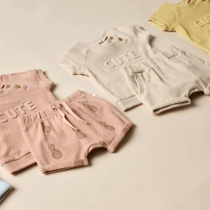 Flatlay-of-Outfits-with-Wilson-and-Frenchy-Organic-Terry-Slouch-Shorts-Naked-Baby-Eco-Boutique