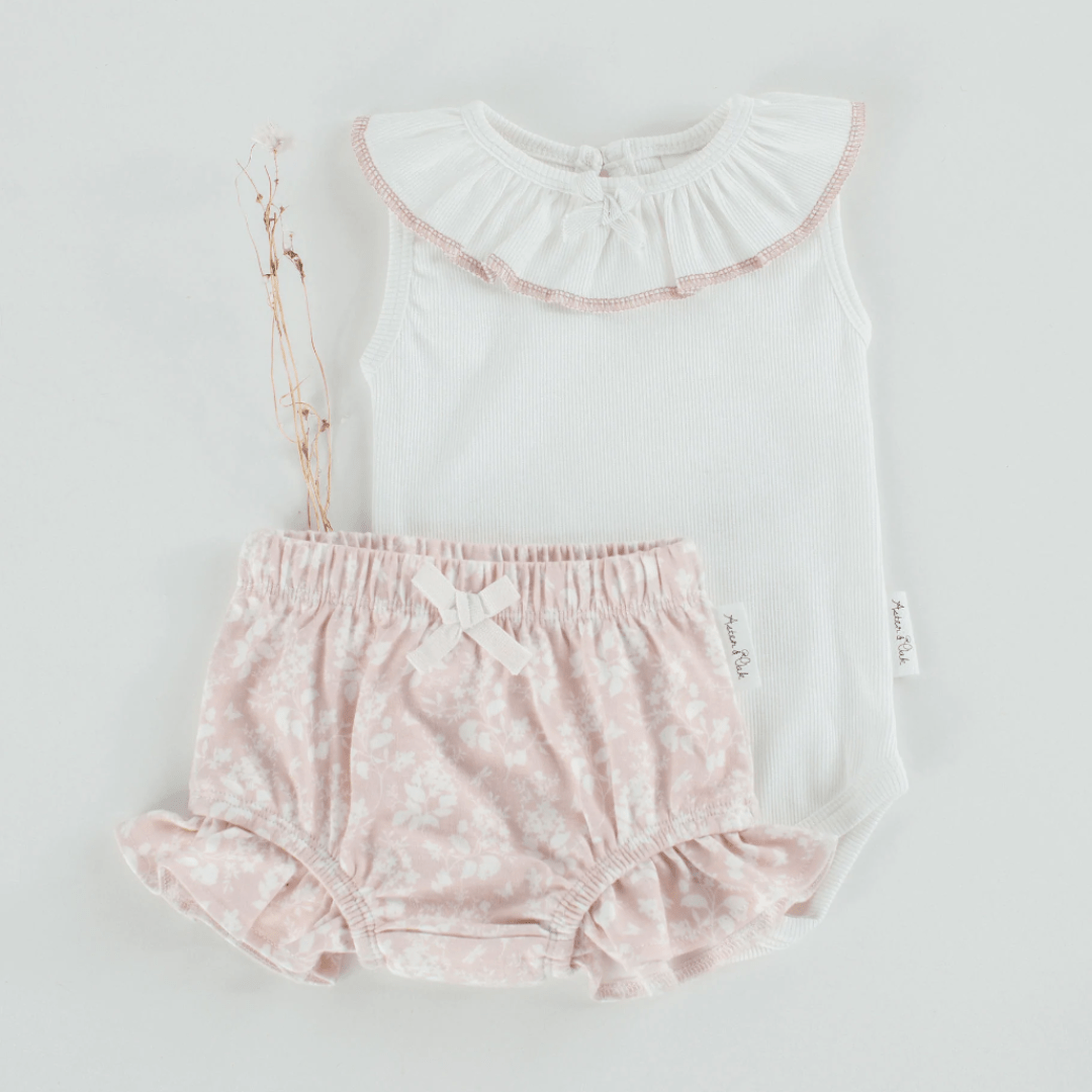 Flatlay-with-Onesie-and-Aster-and-Oak-Organic-Ruffle-Bloomers-Naked-Baby-Eco-Boutique