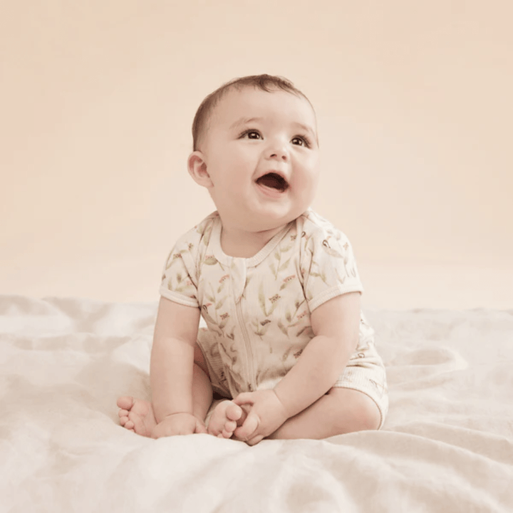 Happy-Baby-Wearing-Wilson-And-Frenchy-Organic-Rib-Boyleg-Zipsuit-Peek-a-Boo-Naked-Baby-Eco-Boutique