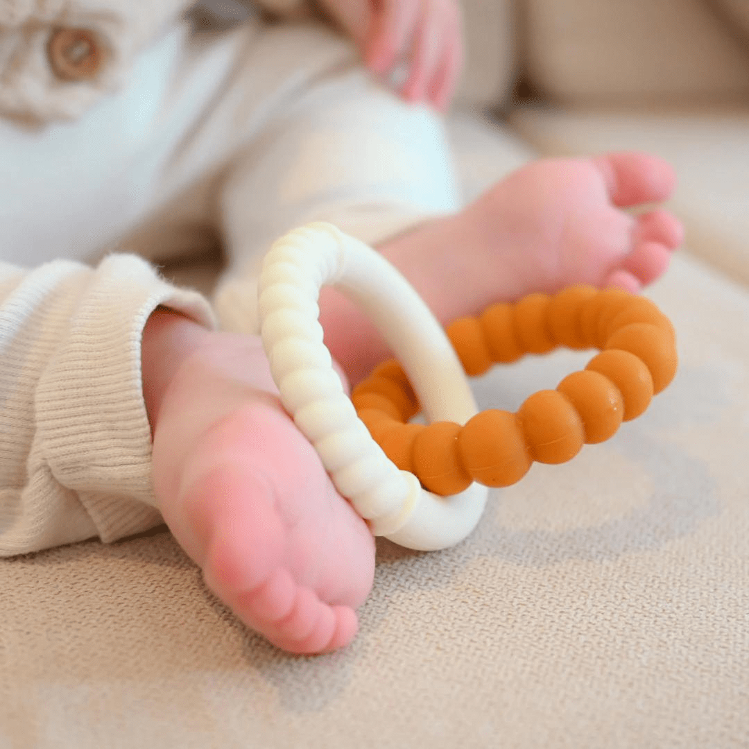 Jellystone-Designs-Silicone-Sunshine-Teether-Oat-And-Honey-With-Little-Baby-Feet-Naked-Baby-Eco-Boutique