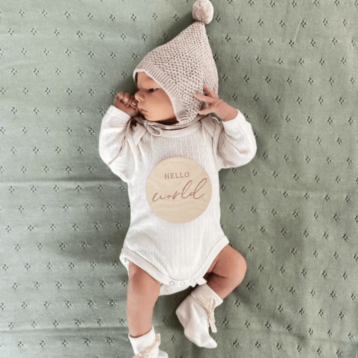 Little-Baby-Lying-On-Over-The-Dandelions-Organic-Cotton-Heirloom-Blanket-Thyme-Naked-Baby-Eco-Boutique
