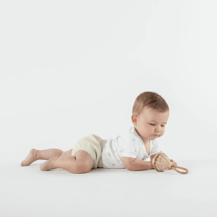 Little-Baby-On-Tummy-WearingAster-And-Oak-Organic-Cotton-Onesie-Little-Leaf-Naked-Baby-Eco-Boutique