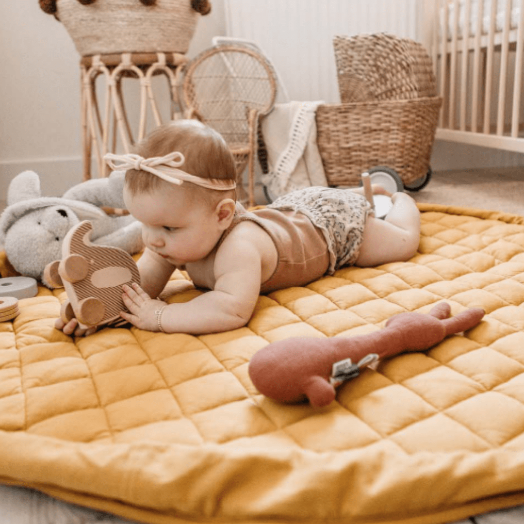 Little-Baby-Playing-On-Play-And-Go-Organic-Platmat-And-Storage-Bag-Mustard-Chai-Tea-Naked-Baby-Eco-Boutique