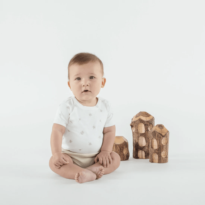 Little-Baby-Wearing-Aster-And-Oak-Organic-Cotton-Onesie-Little-Leaf-Naked-Baby-Eco-Boutique
