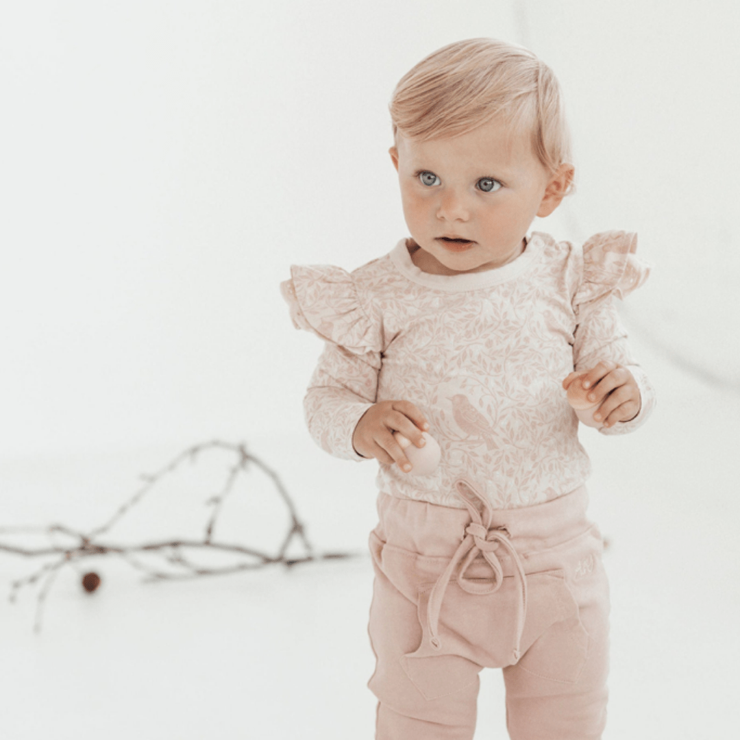 Little-Baby-Wearing-Aster-And-Oak-Song-Bird-Ruffle-Onesie-Naked-Baby-Eco-Boutique