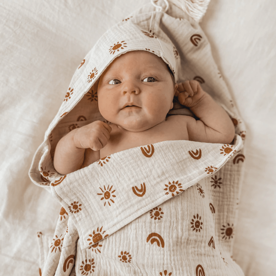 Little-Baby-Wearing-Over-The-Dandelions-Organic-Muslin-Hooded-Towel-Sand-Amber-Naked-Baby-Eco-Boutique