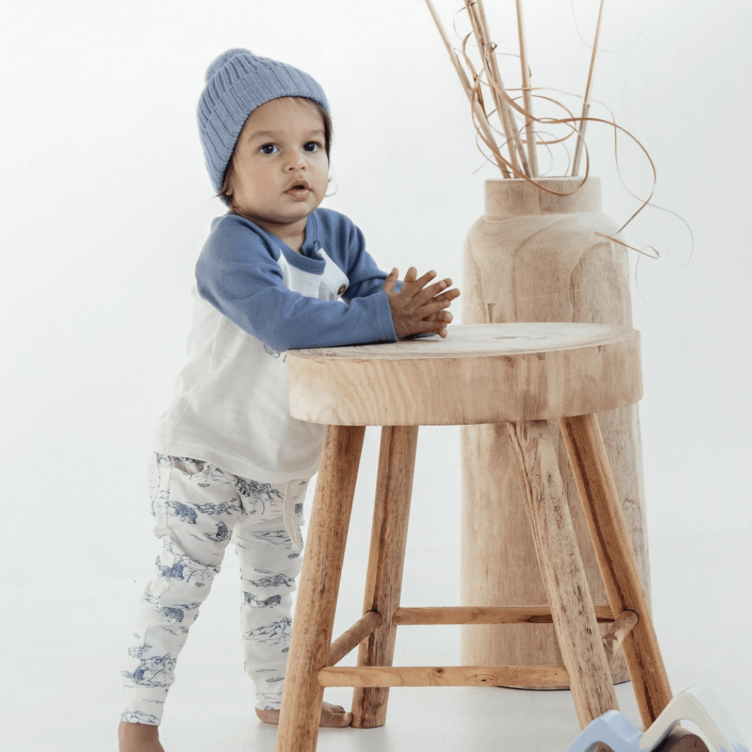 Little-Boy-Standing-at-Stool-Wearing-Aster-and-Oak-Organic-Cotton-Harem-Pants-Arctic-Naked-Baby-Eco-Boutique