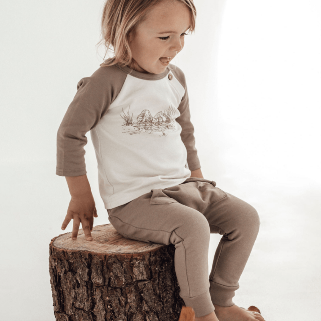 Little-Boy-Wearing-Aster-And-Oak-Organic-Cotton-Jogger-Pants-Timber-Naked-Baby-Eco-Boutique