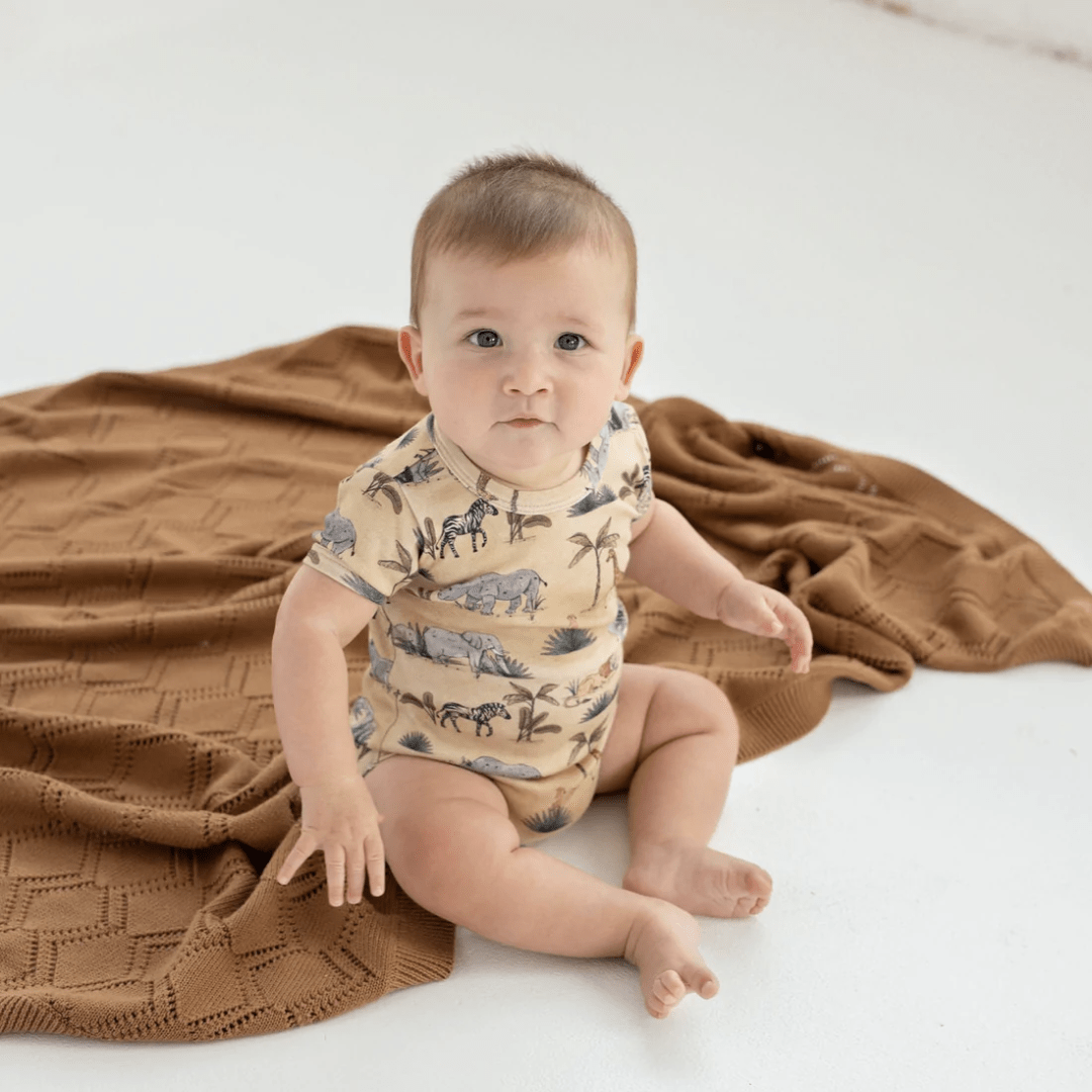Little-Boy-Wearing-Aster-And-Oak-Organic-Cotton-Onesie-Safari-Naked-Baby-Eco-Boutique