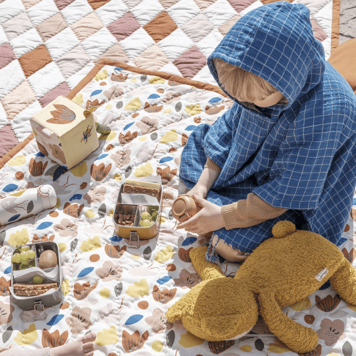 Little-Boy-Wearing-Fabelab-Organic-Cotton-Grid-Kids-Poncho-Blue-Naked-Baby-Eco-Boutique