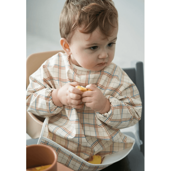 Little-Boy-Wearing-Grech-And-Co-Recycled-Smock-Bib-Plaid-Naked-Baby-Eco-Boutique