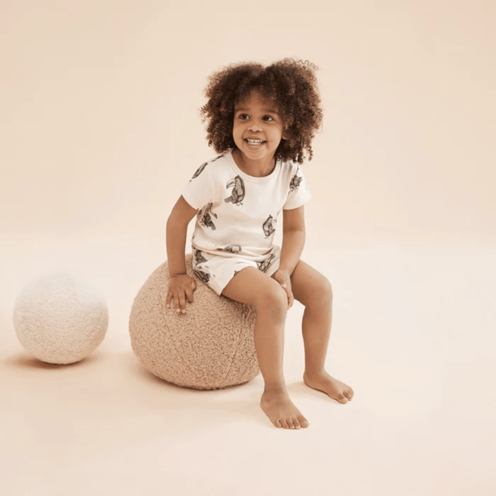 Little-Boy-Wearing-Wilson-And-Frenchy-Organic-Rib-Short-Sleeve-Pyjamas-Tommy-Toucan-Naked-Baby-Eco-Boutique