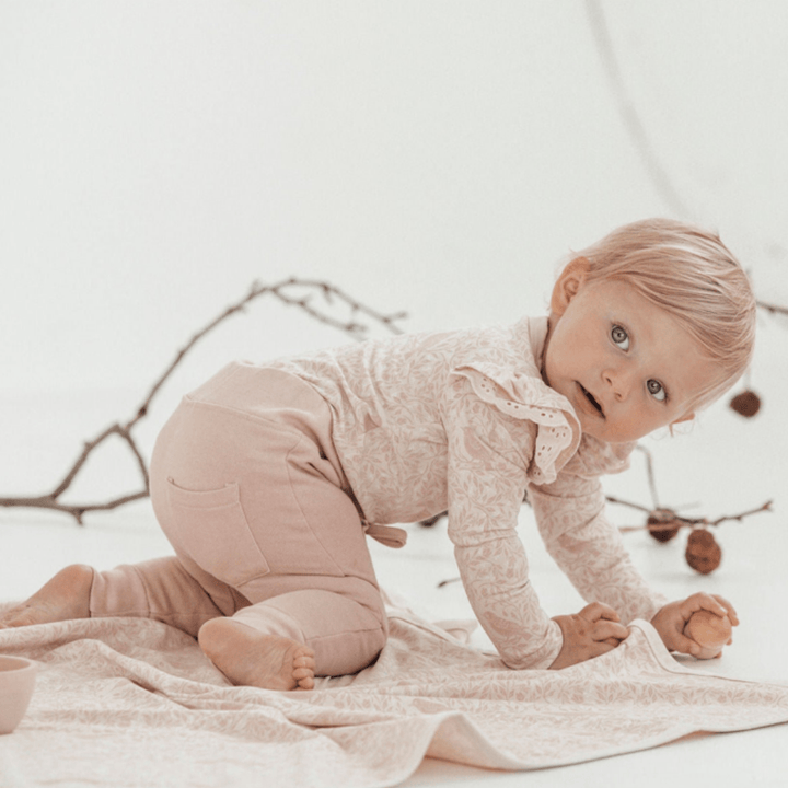Little-Girl-Crawling-Wearing-Aster-And-Oak-Organic-Cotton-Jogger-Pants-Rose-Naked-Baby-Eco-Boutique