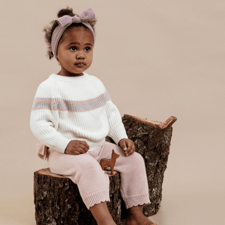 Little-Girl-Sitting-Wearing-Aster-And-Oak-Organic-Knit-Leggings-Naked-Baby-Eco-Boutique