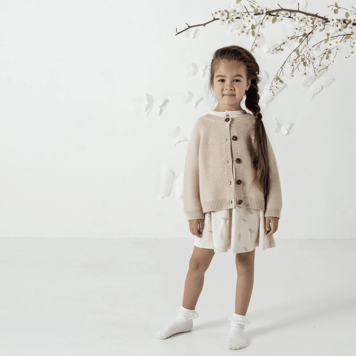 Little-Girl-Wearing-Aster-And-Oak-Organic-Cotton-Chunky-Knit-Cardigan-Oatmeal-Naked-Baby-Eco-Boutique