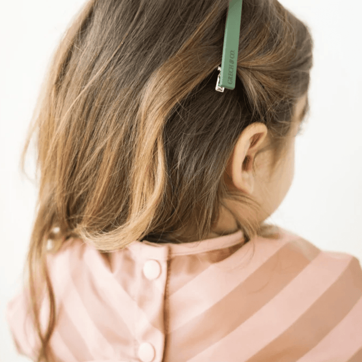 Little-Girl-Wearing-Grech-And-Co-Two-Toned-Grip-Hair-Clips-Two-Pack-Orchard-Naked-Baby-Eco-Boutique