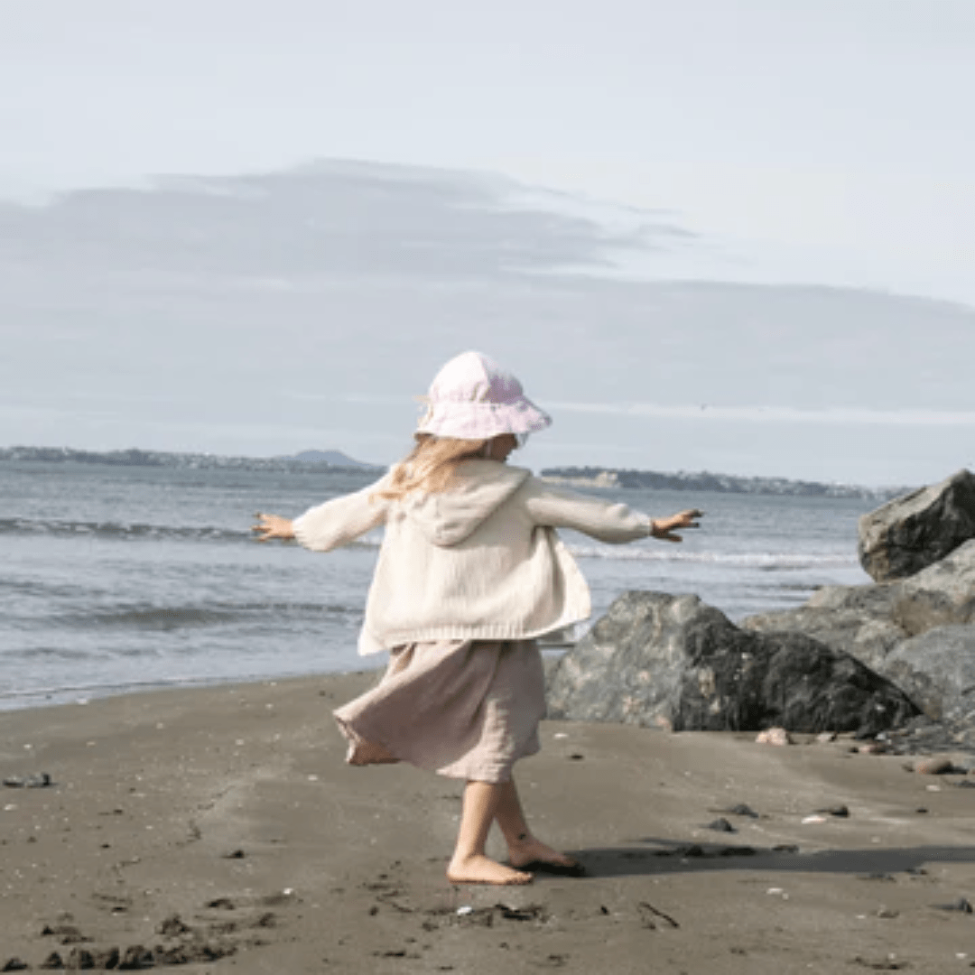 Little-Girl-Wearing-Lola-And-Me-Linen-Sunhat-Pink-Salt-Naked-Baby-Eco-Boutique