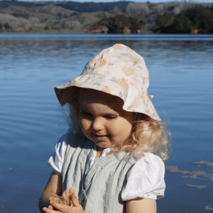 Little-Girl-Wearing-Lola-And-Me-Linen-Sunhat-Summer-Rose-Naked-Baby-Eco-Boutique