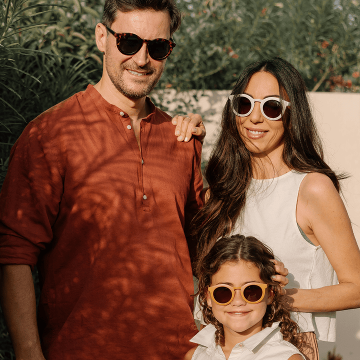 Mum-Dad-and-Daughter-Wearing-Grech-and-Co-Sustainable-Polarised-Adult-Sunglasses-Naked-Baby-Eco-Boutique