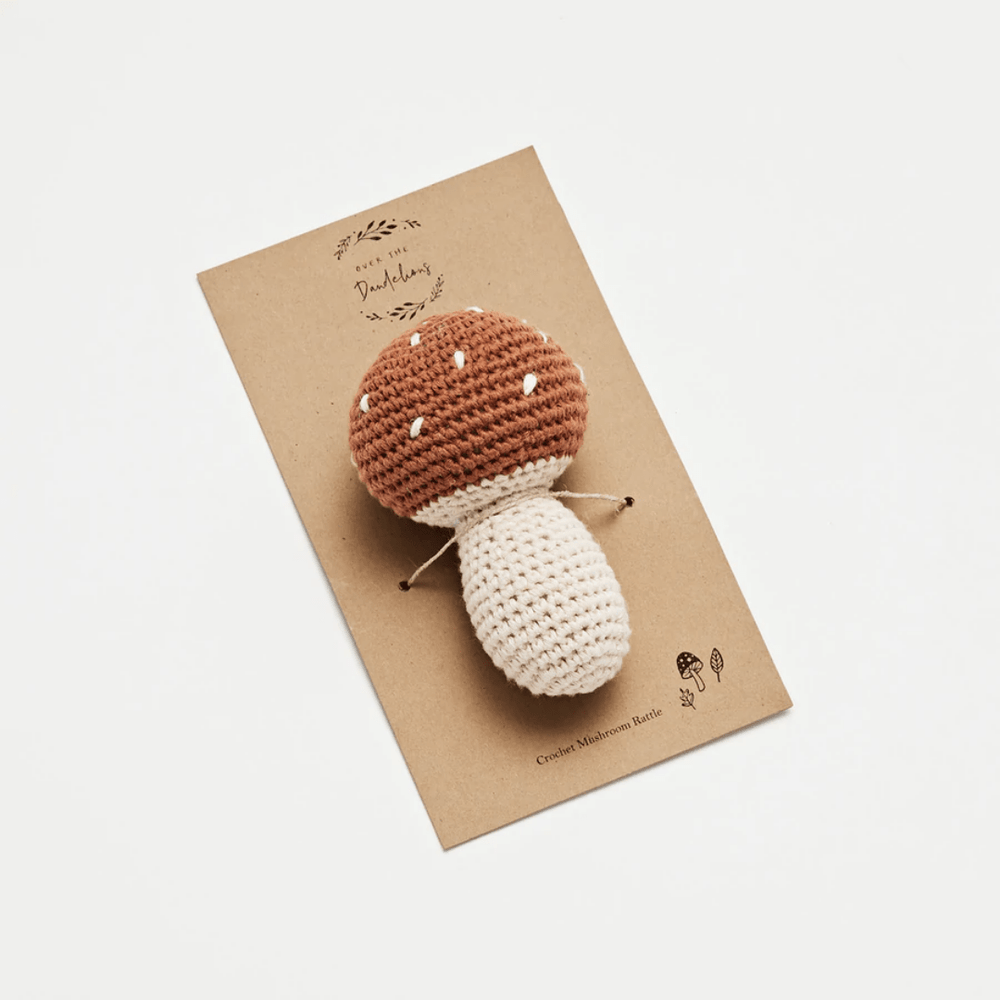 Over-The-Dandelions-Mushroom-Rattle-On-Packaging-Naked-Baby-Eco-Boutique