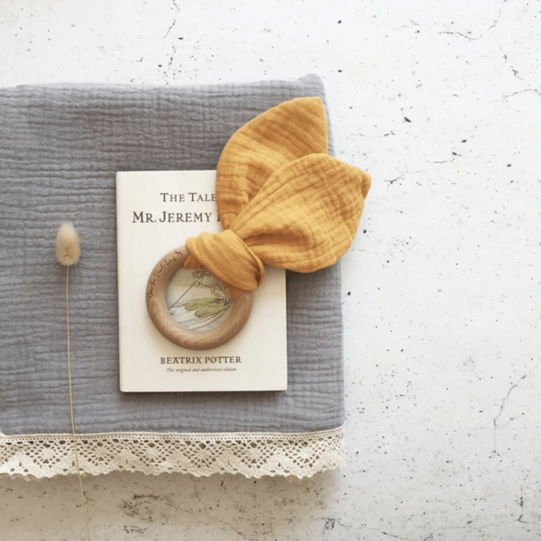 Over-The-Dandelions-Organic-Muslin-Bunny-Ears-Teether-Saffron-Flatlay-Naked-Baby-Eco-Boutique