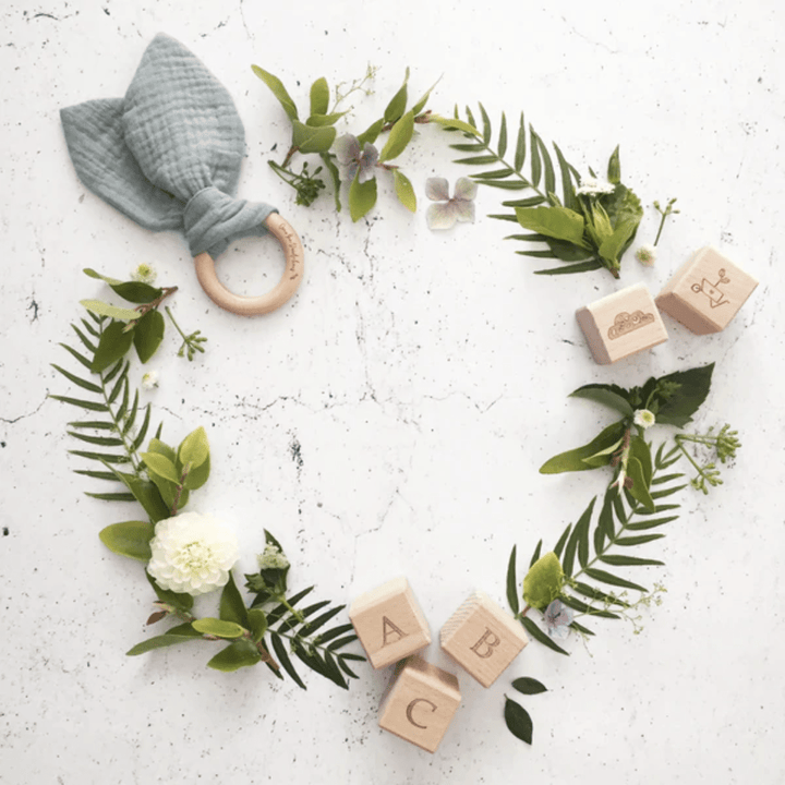 Over-The-Dandelions-Organic-Muslin-Bunny-Ears-Teether-Sage-Flatlay-Naked-Baby-Eco-Boutique