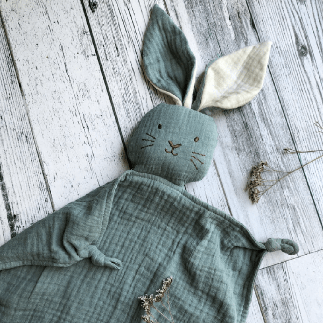 Over-The-Dandelions-Organic-Muslin-Comforter-Sage-Flatlay-Naked-Baby-Eco-Boutique