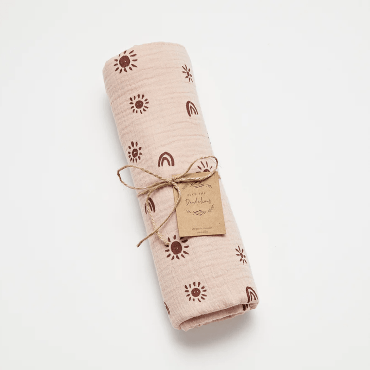 Over-The-Dandelions-Organic-Muslin-Swaddle-Blanket-Blush-Plum-Rolled-With-Tag-Naked-Baby-Eco-Boutique