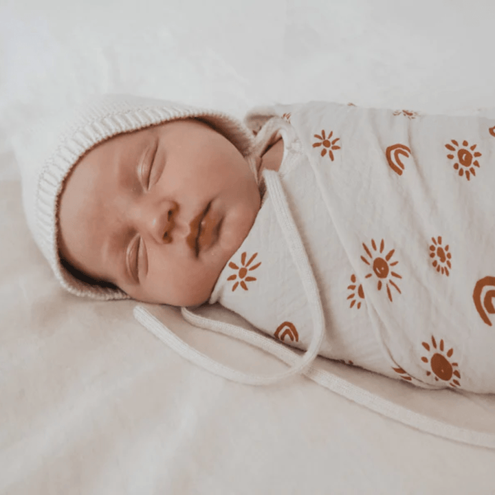 Over-The-Dandelions-Organic-Muslin-Swaddle-Blanket-Sand-Amber-Little-Baby-Sleeping-Naked-Baby-Eco-Boutique