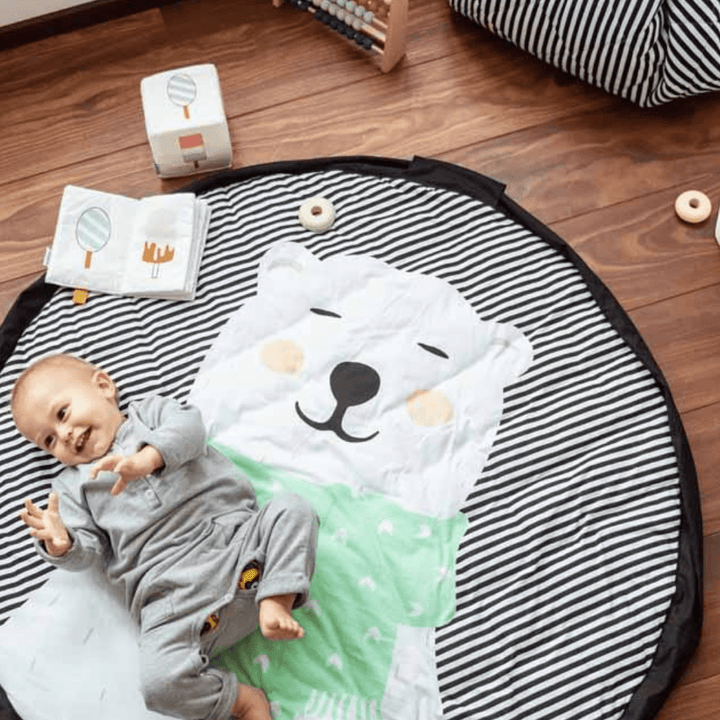 Play-And-Go-Soft-Toy-Storage-Bag-And-Playmat-Polar-Bear-Baby-Laying-On-Play-Mat-Naked-Baby-Eco-Boutique
