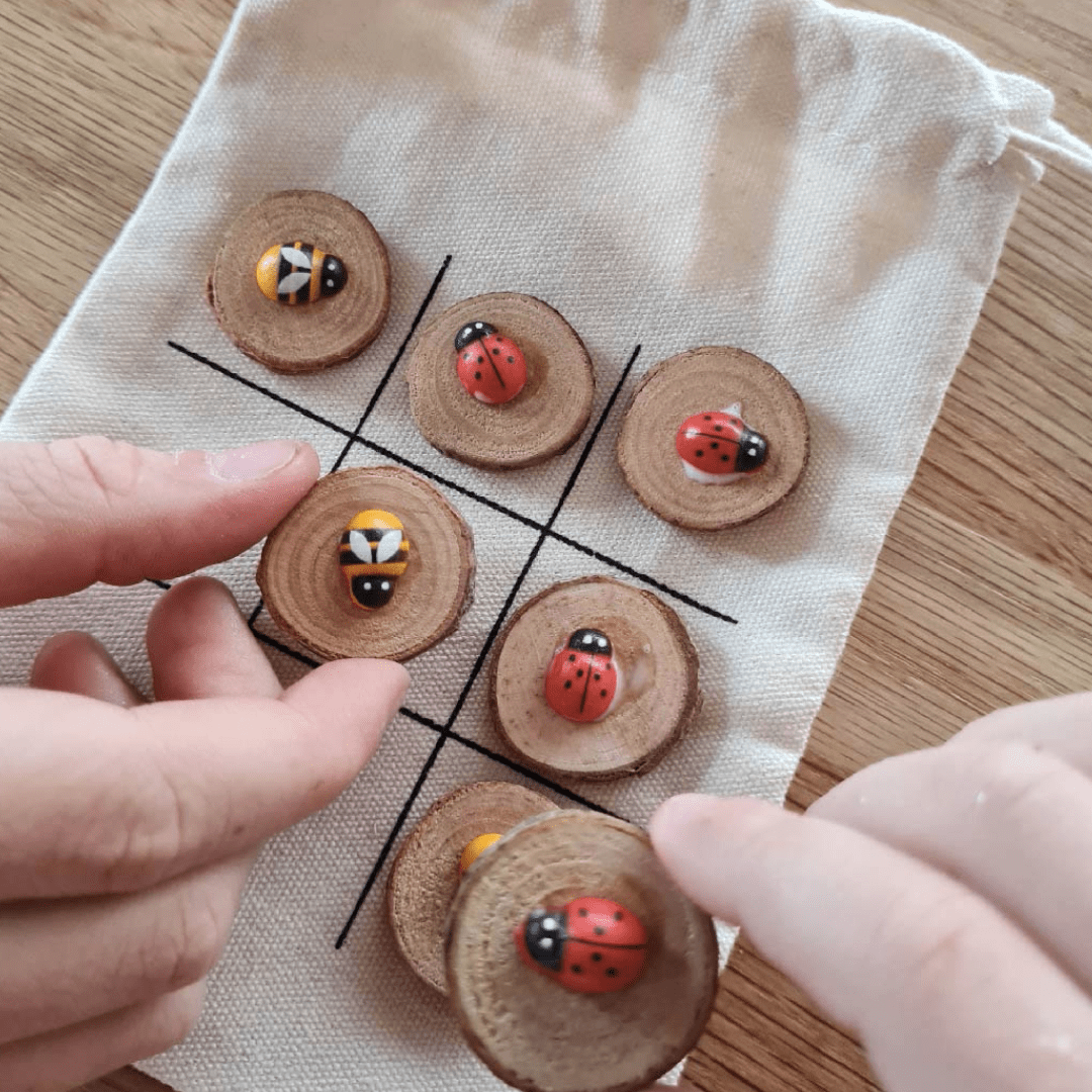 Playing-Poppy-And-Daisy-Tic-Tac-Toe-Game-Naked-Baby-Eco-Boutique