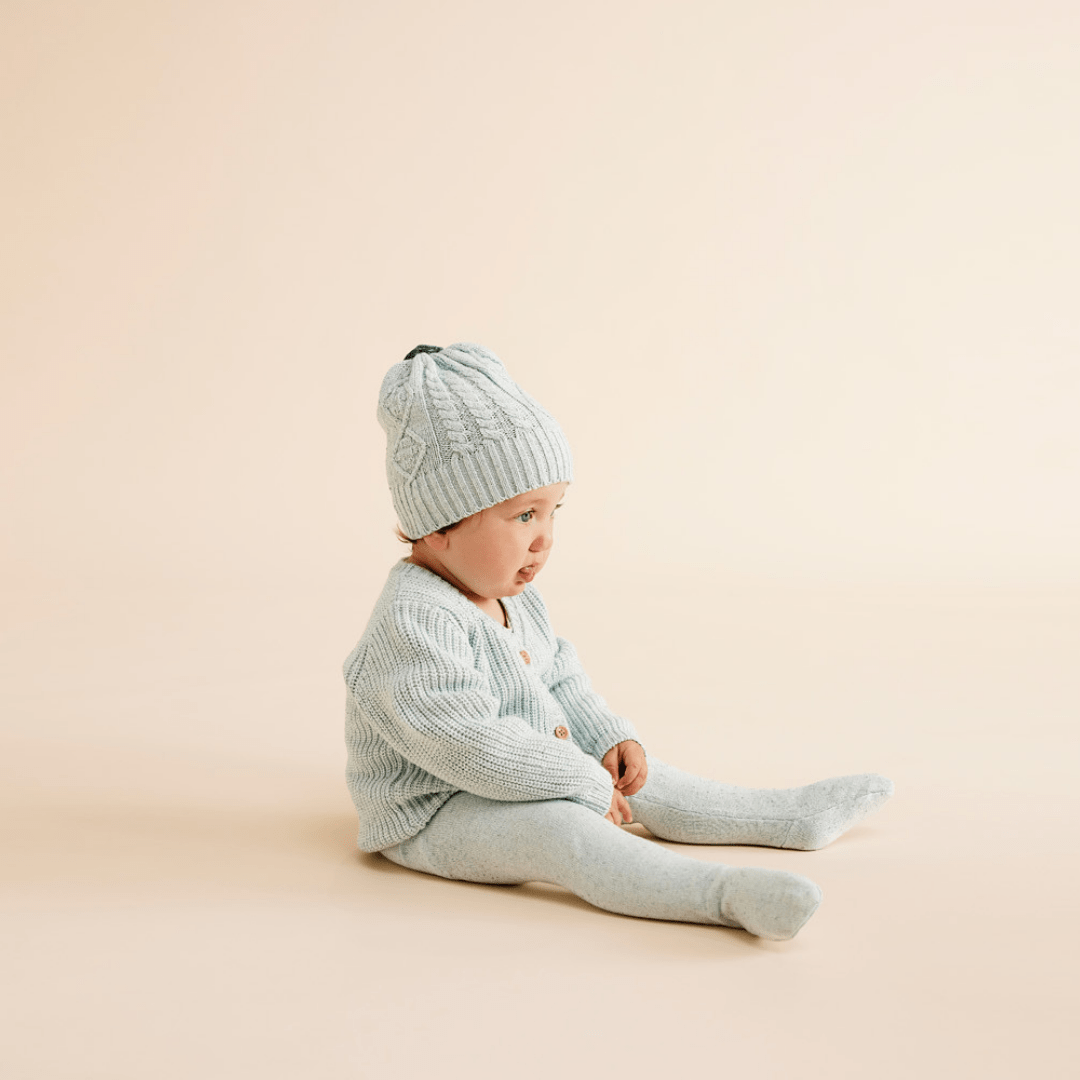 Side-View-of-Baby-Wearing-Wilson-and-Frenchy-Cable-Knit-Hat-Mint-Fleck-Naked-Baby-Eco-Boutique