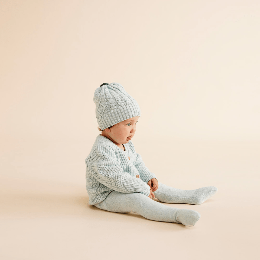Side-View-of-Baby-Wearing-Wilson-and-Frenchy-Knitted-Leggins-with-Feet-Mit-Fleck-Naked-Baby-Eco-Boutique