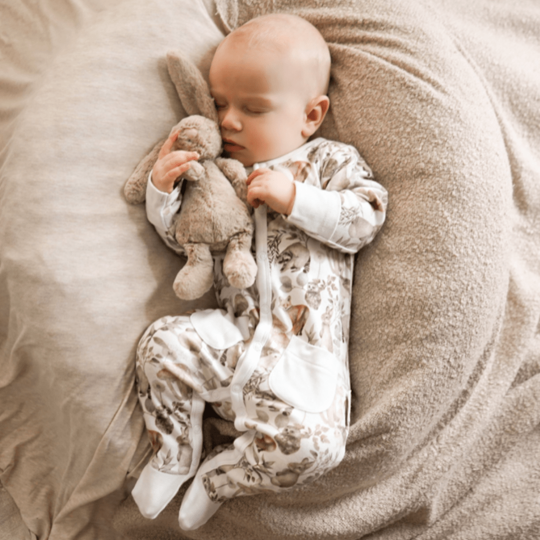Sleeping-Baby-Wearing-Aster-And-Oak-Organic-Cotton-Baby-Pyjamas-Woodland-Naked-Baby-Eco-Boutique