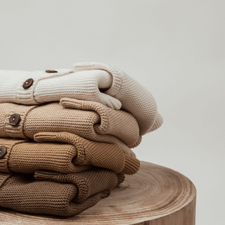 Stack-Of-Cardigans-Showing-Style-Options-Aster-And-Oak-Organic-Chunky-Knit-Cardigan-Off-White-Naked-Baby-Eco-Boutique