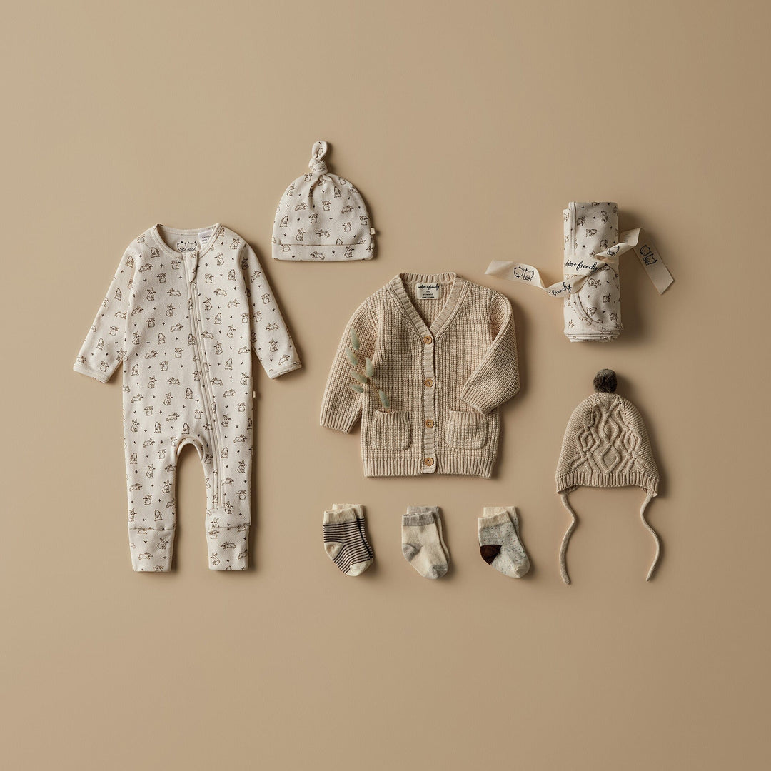 Styled-Flatlay-with-Wilson-and-Frenchy-Pointelle-Baby-Pyjamas-Beanie-Bunny-Love-Naked-Baby-Eco-Boutique