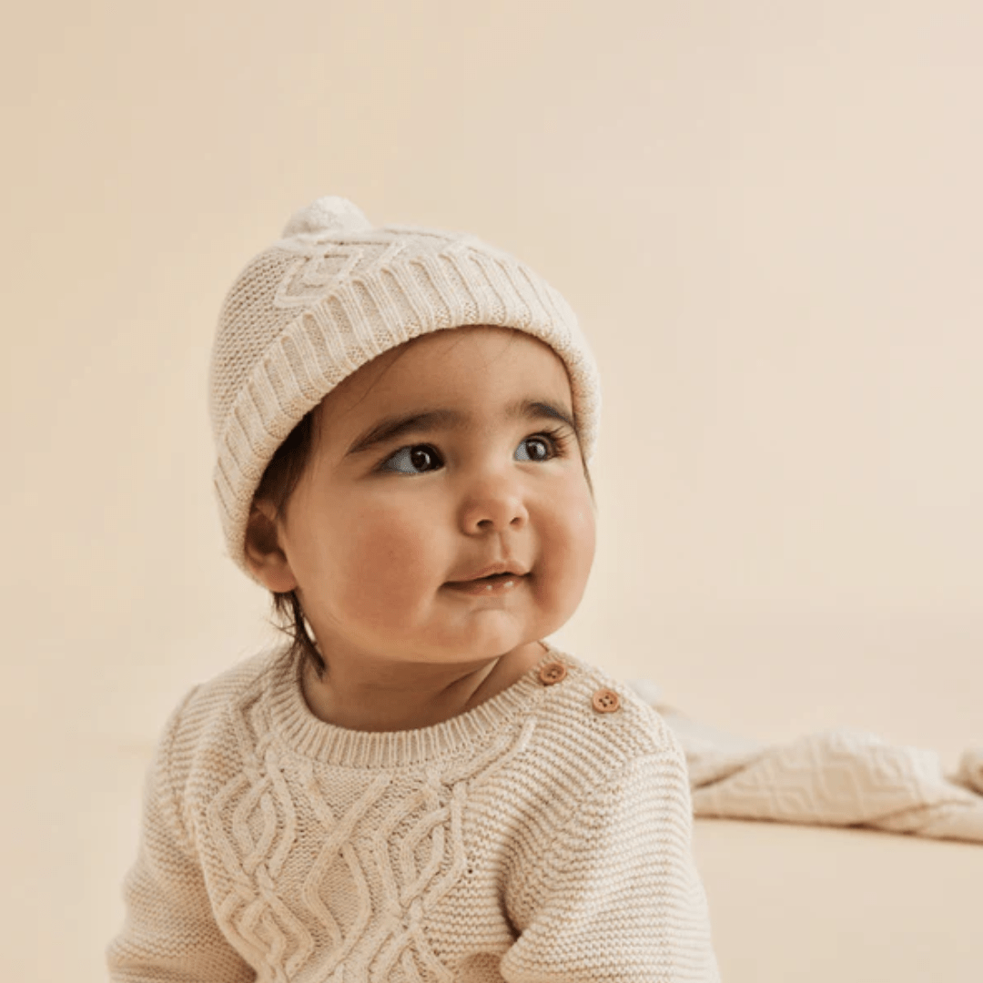 Wilson-And-Frenchy-Knitted-Cable-Hat-Sand-Melange-On-Baby-Naked-Baby-Eco-Boutique